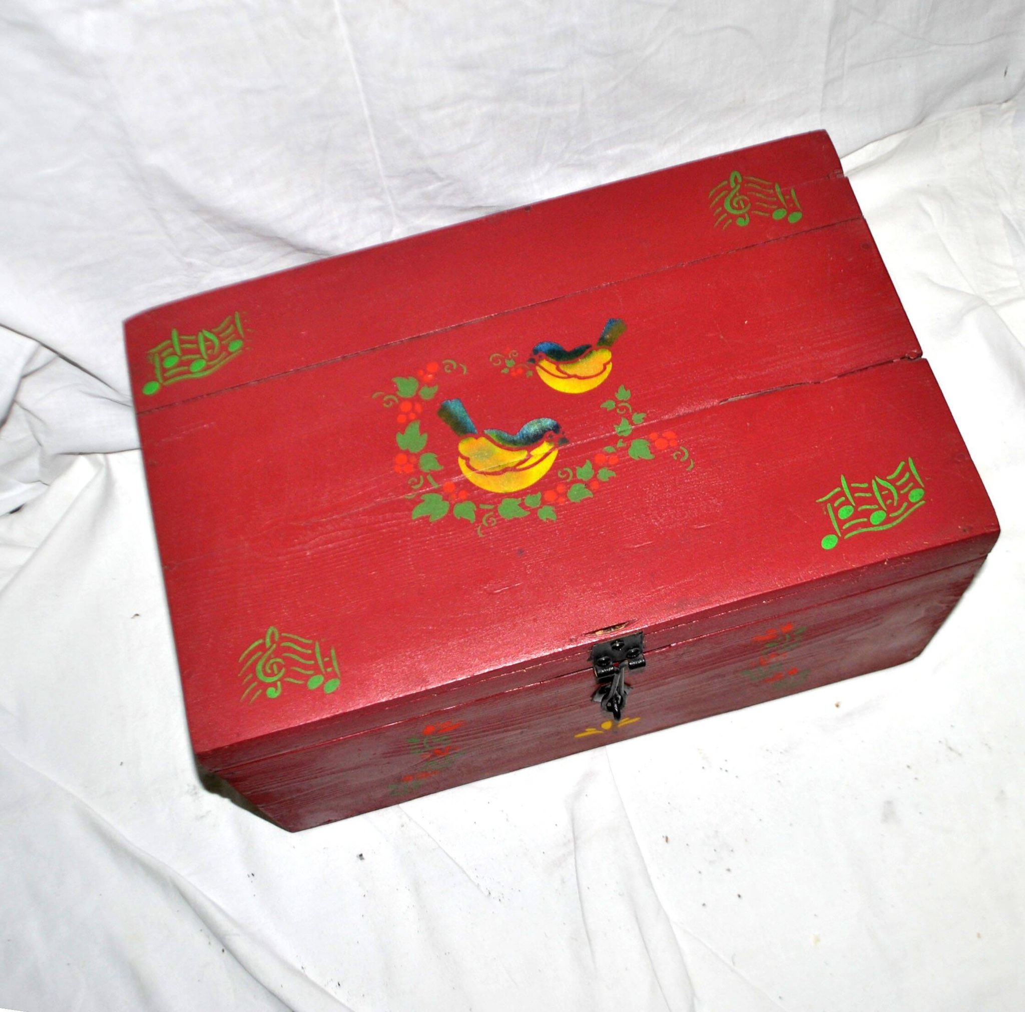 Vintage wooden trunk – toy chest or music box with painted stencil bird decoration.