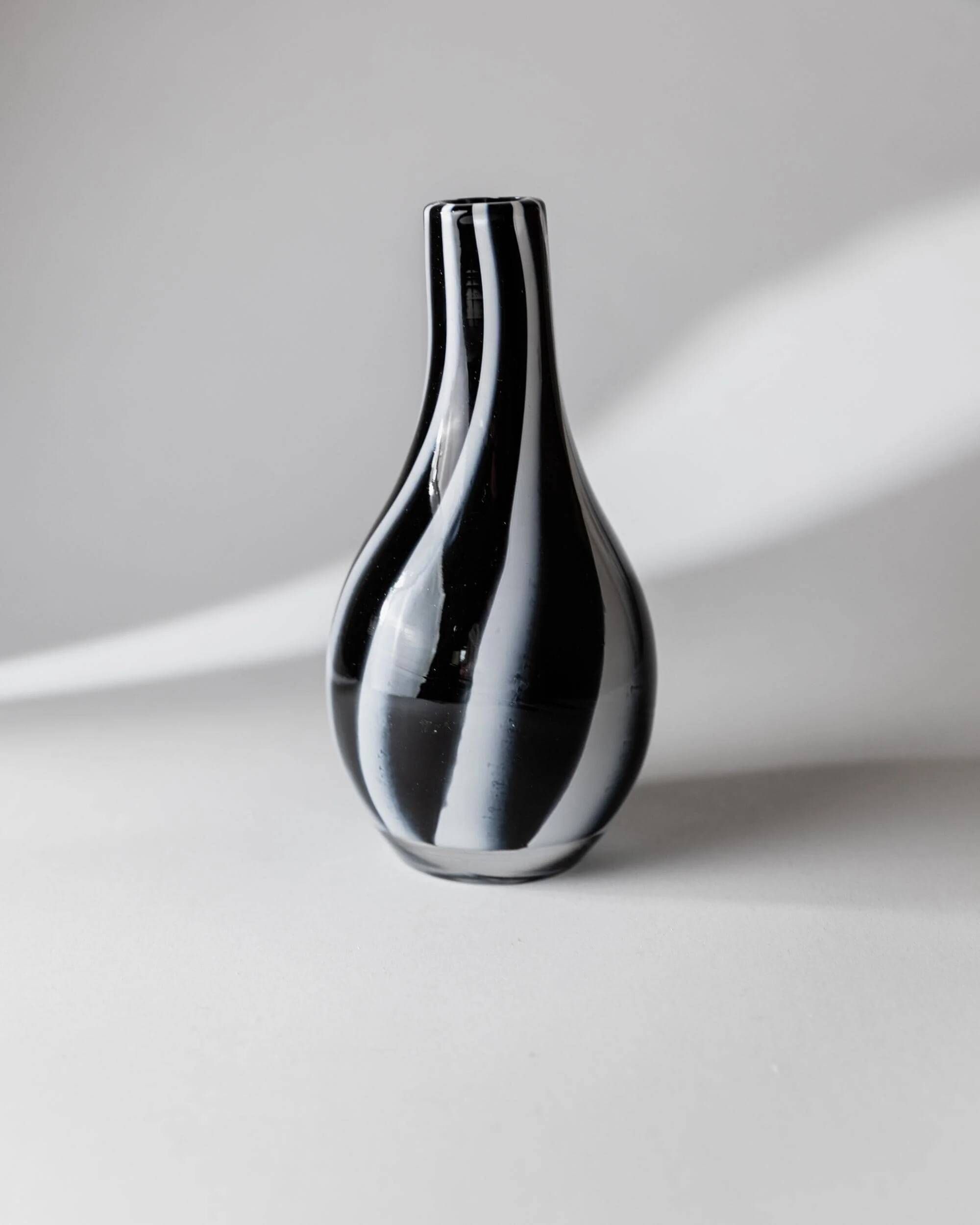 Vintage Murano glass vase from the 1980s, black and white swirl pattern, thick Italian art glass.
