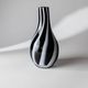 Vintage Murano glass vase from the 1980s, black and white swirl pattern, thick Italian art glass.