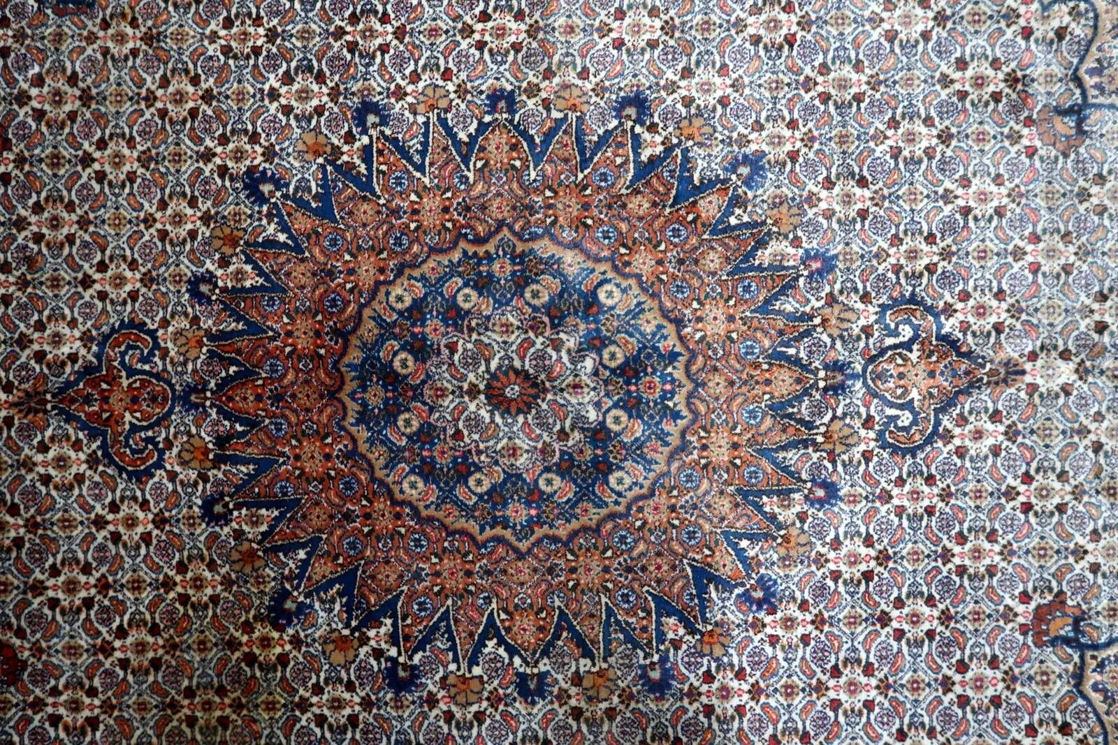 1940s handmade wool medallion rug, ivory and navy, 212 × 312 cm