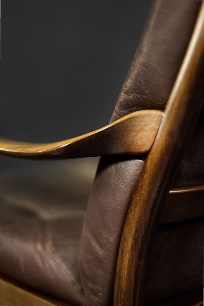 Modern vintage Danish armchair in beech and brown leather by Farstrup Møbler, 1970.