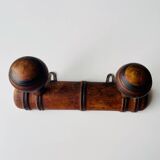 Wooden wall-mounted coat rack with two hooks