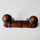 Wooden wall-mounted coat rack with two hooks