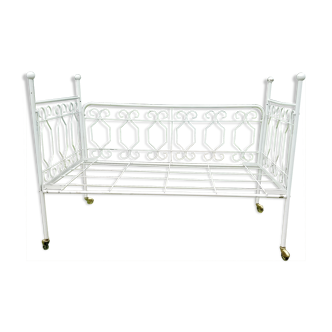 Old wrought iron bed bench