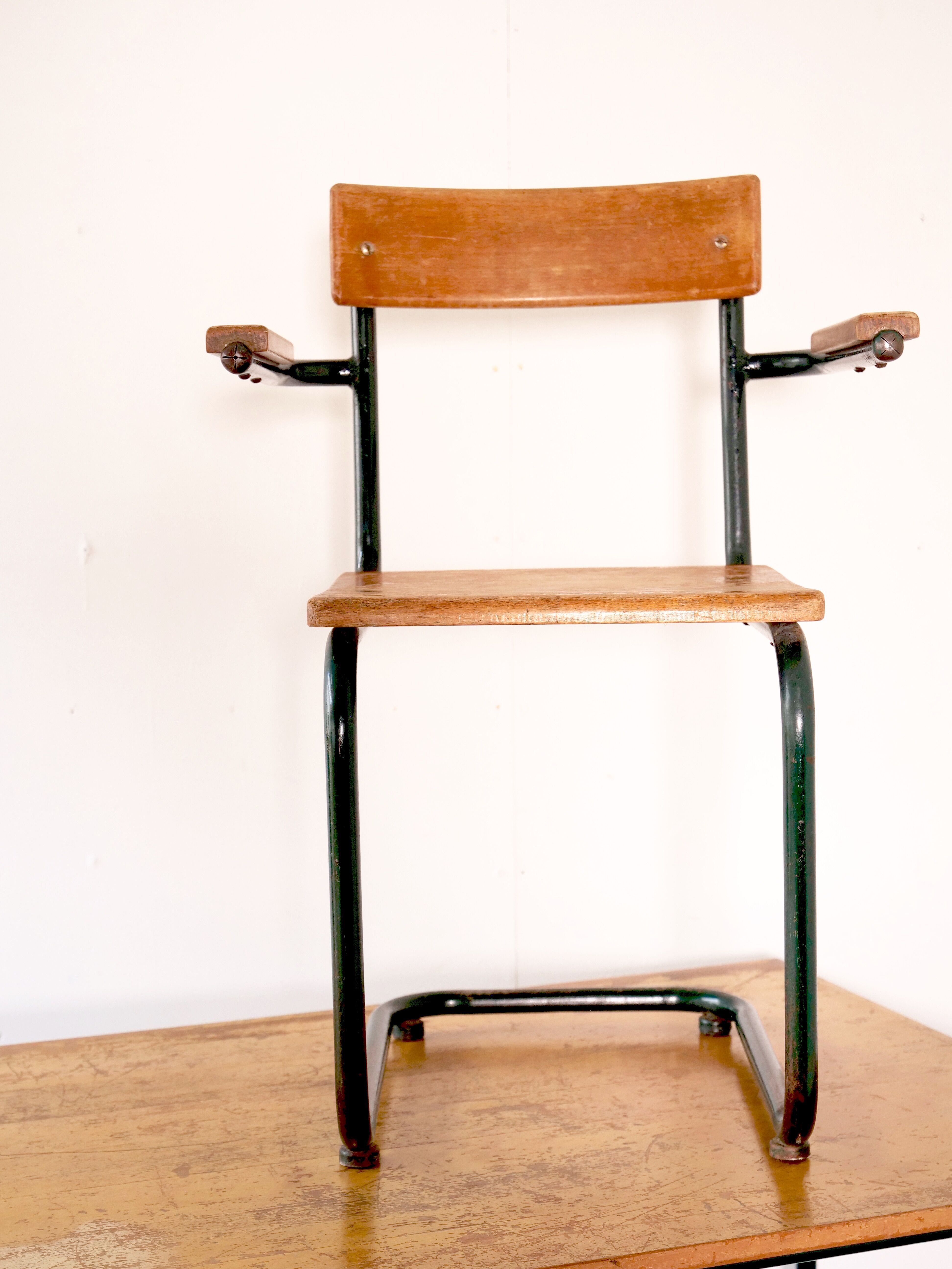 Desk with bauhaus style tubular steel chair