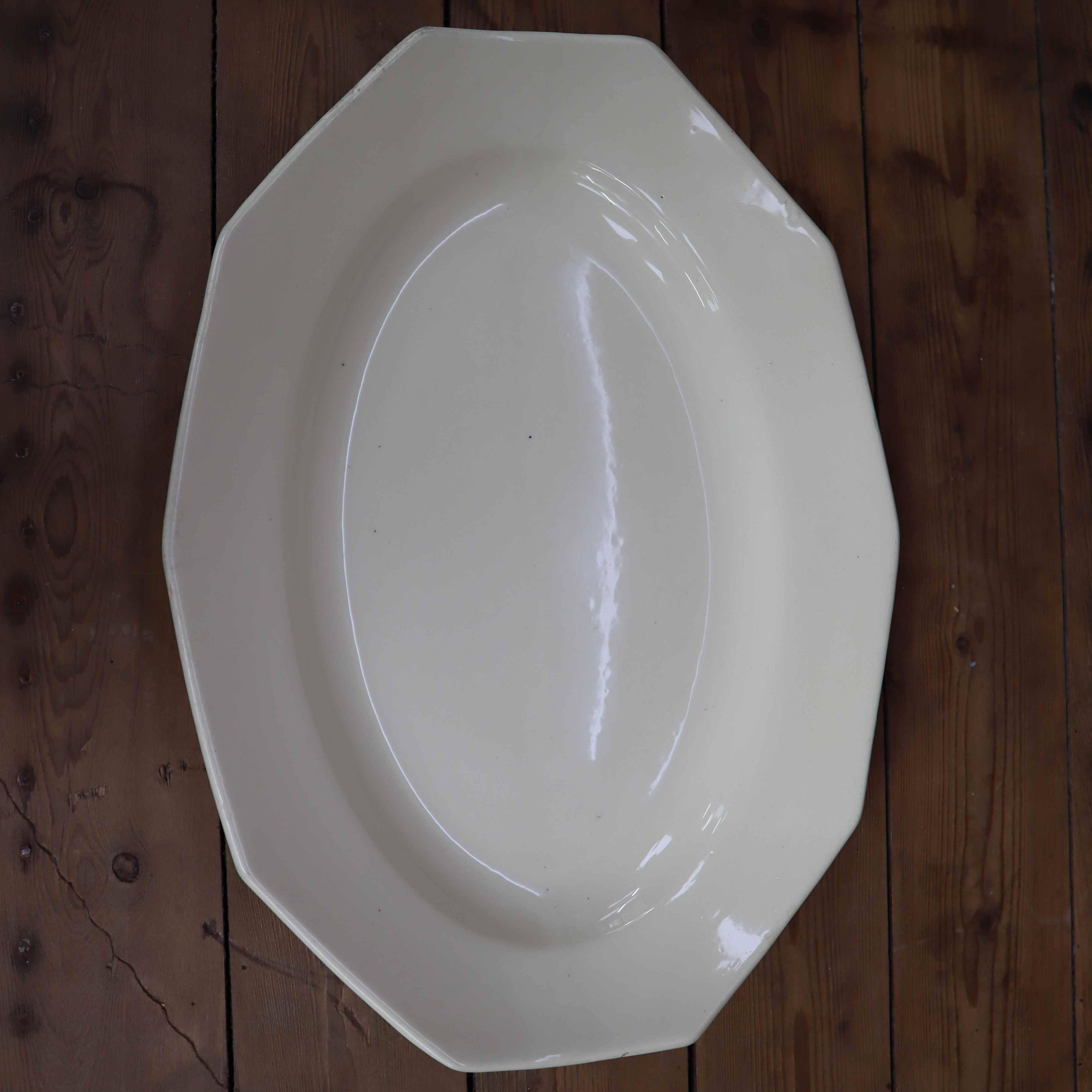 Oval octagonal dish in ecru white earthenware Moulin des Loups