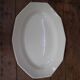 Oval octagonal dish in ecru white earthenware Moulin des Loups