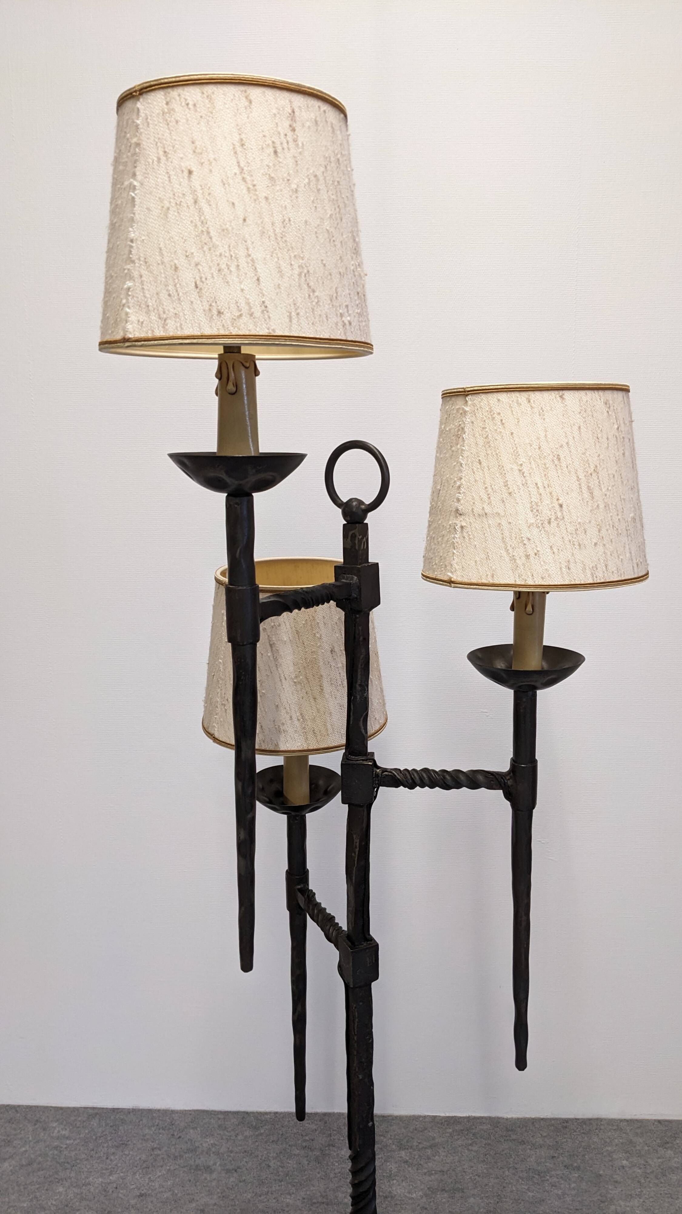 Brutalist tripod floor lamp with 3 lights in wrought iron, France circa 1950.
