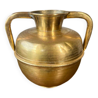 Old hammered brass jar