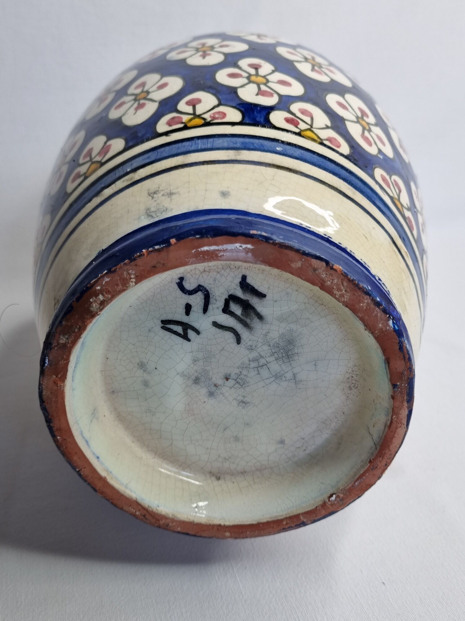 Moroccan handicraft vase in blue enamelled terracotta decorated with flowers, 32 cm