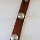 Wooden and stainless steel coat holders from the 1920s