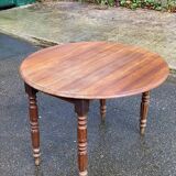 Louis Philippe round table with leaves, solid wood, 19th century, 95cm.