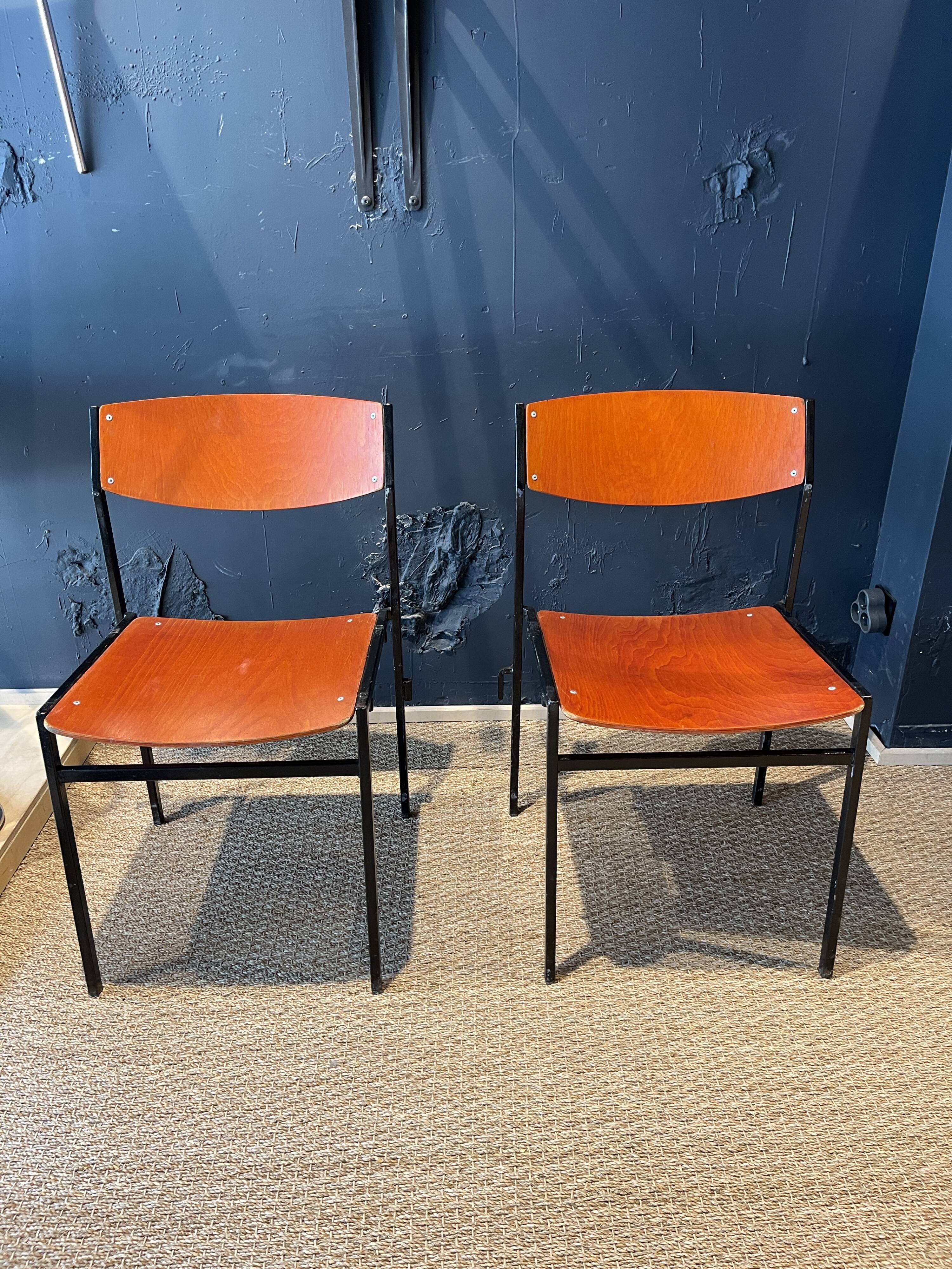 Pair of Gijs Van Der Sluis chairs in orange wood with black legs, Netherlands