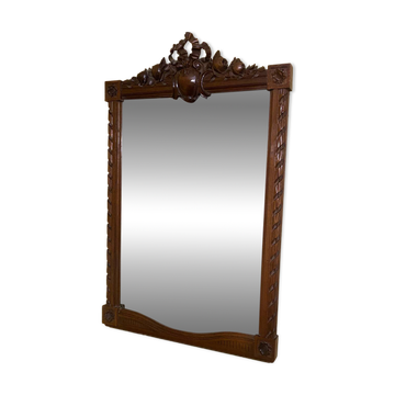 Carved wooden mirror in Louis XVI style