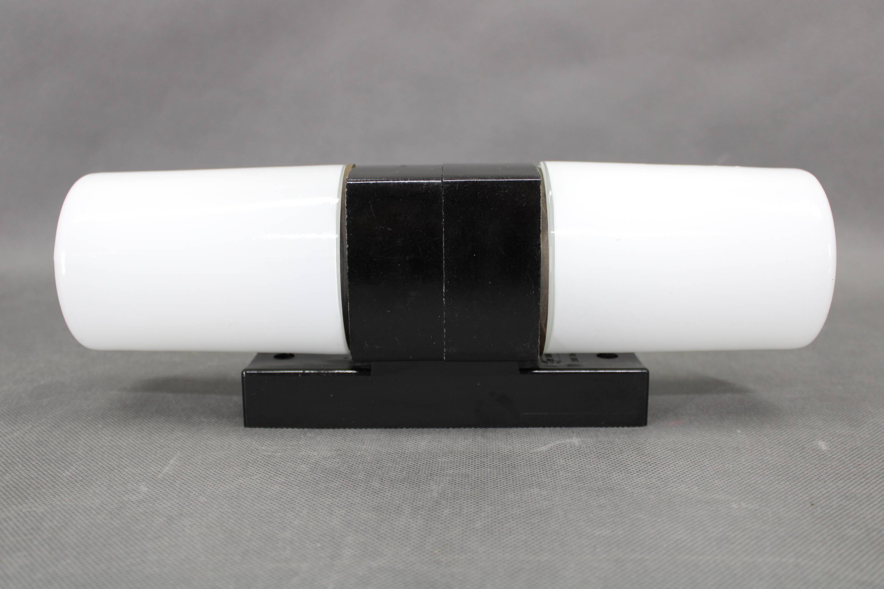 Mid-century Czech wall light in bakelite and glass, 1960s