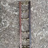 Coat rack, teak and brass coat hooks.