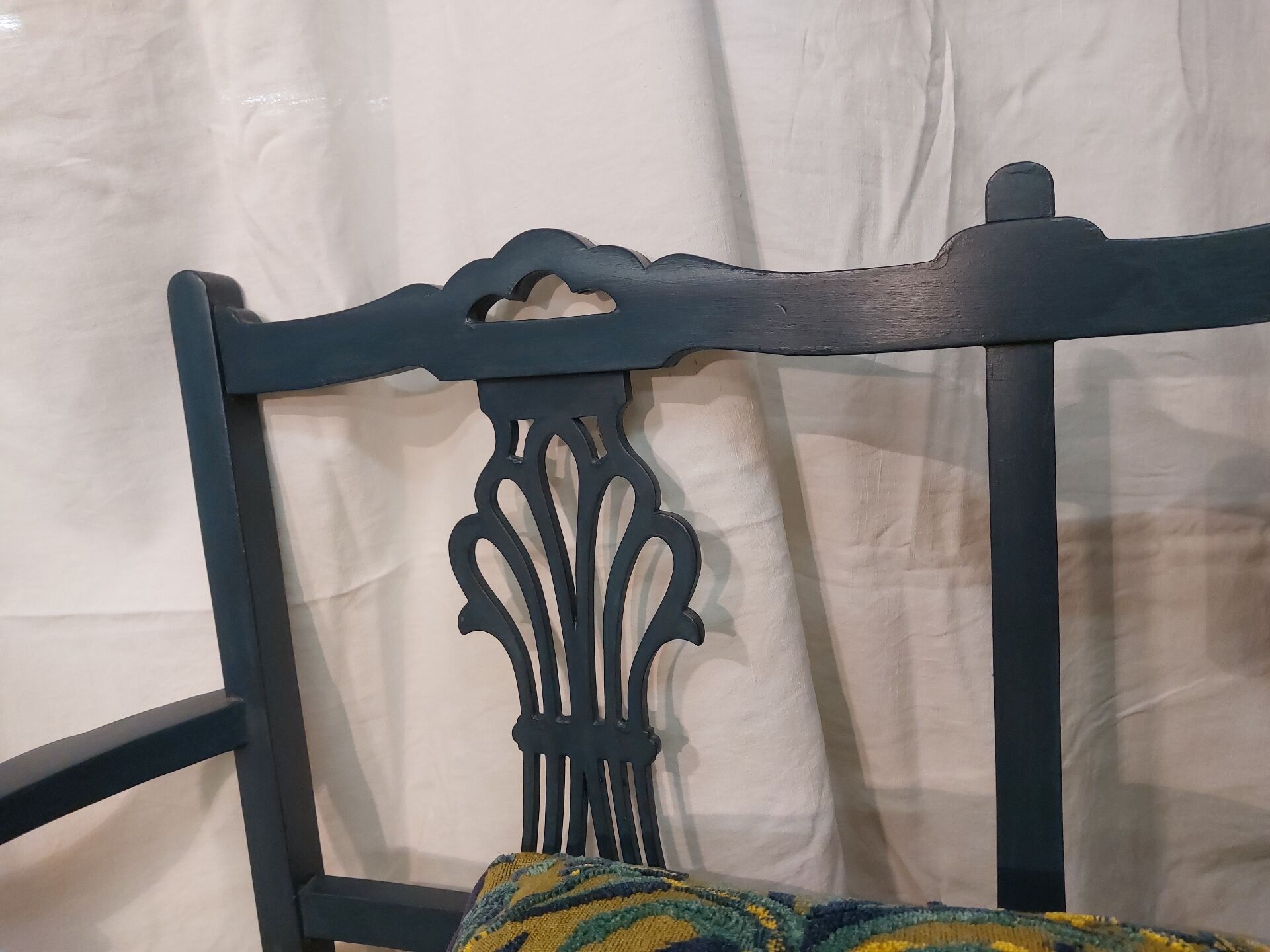 Pretty painted and upholstered bench in green and blue.