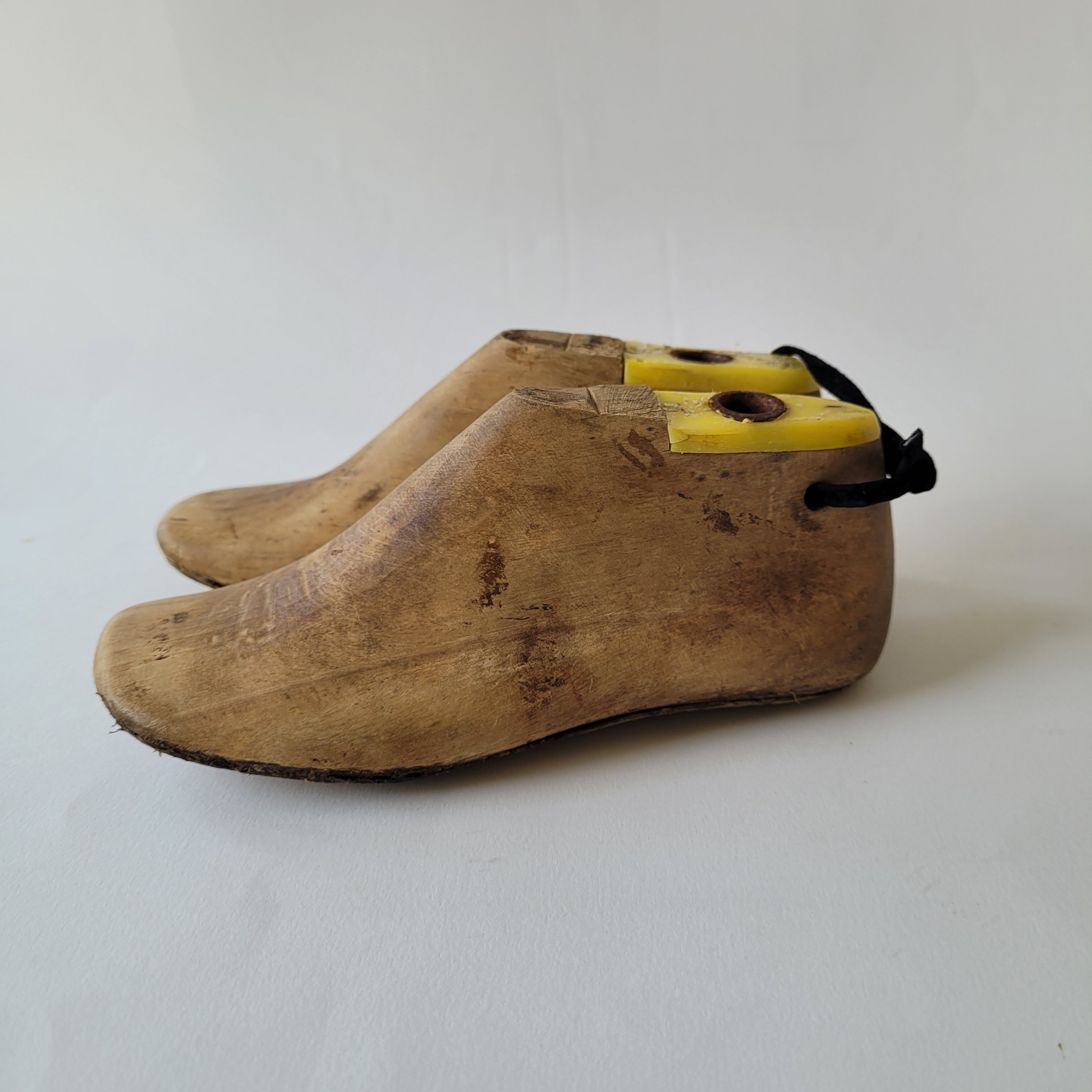 Pair of old wooden shoe shapes