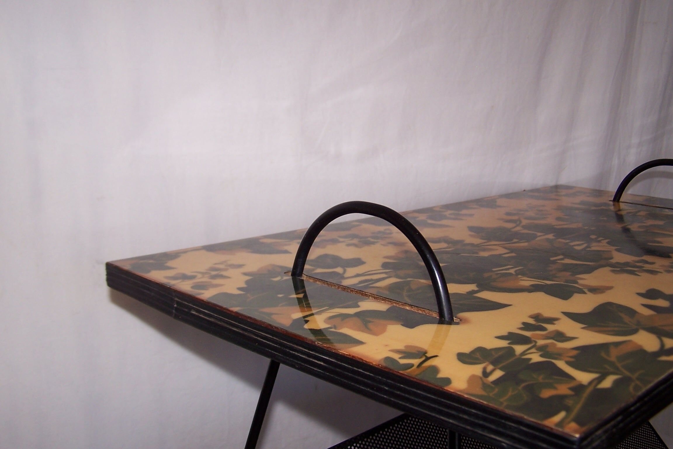 Perforated plate coffee table from the 1950s