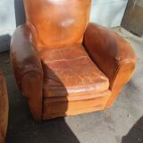 Pair of club chairs with mustaches in havana leather in their juices circa 1930