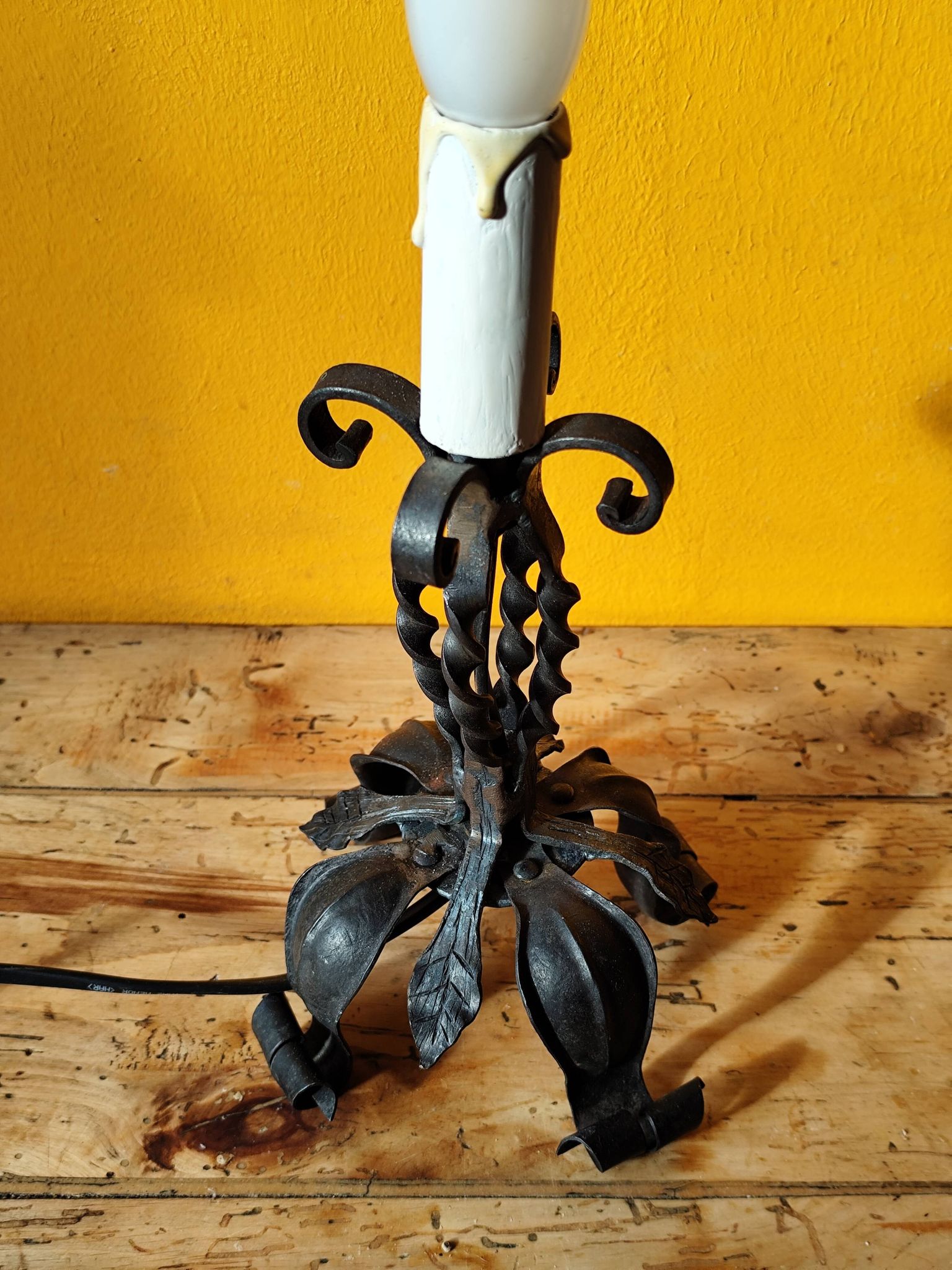 Old metal lamp and fake candle