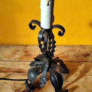 Old metal lamp and fake candle