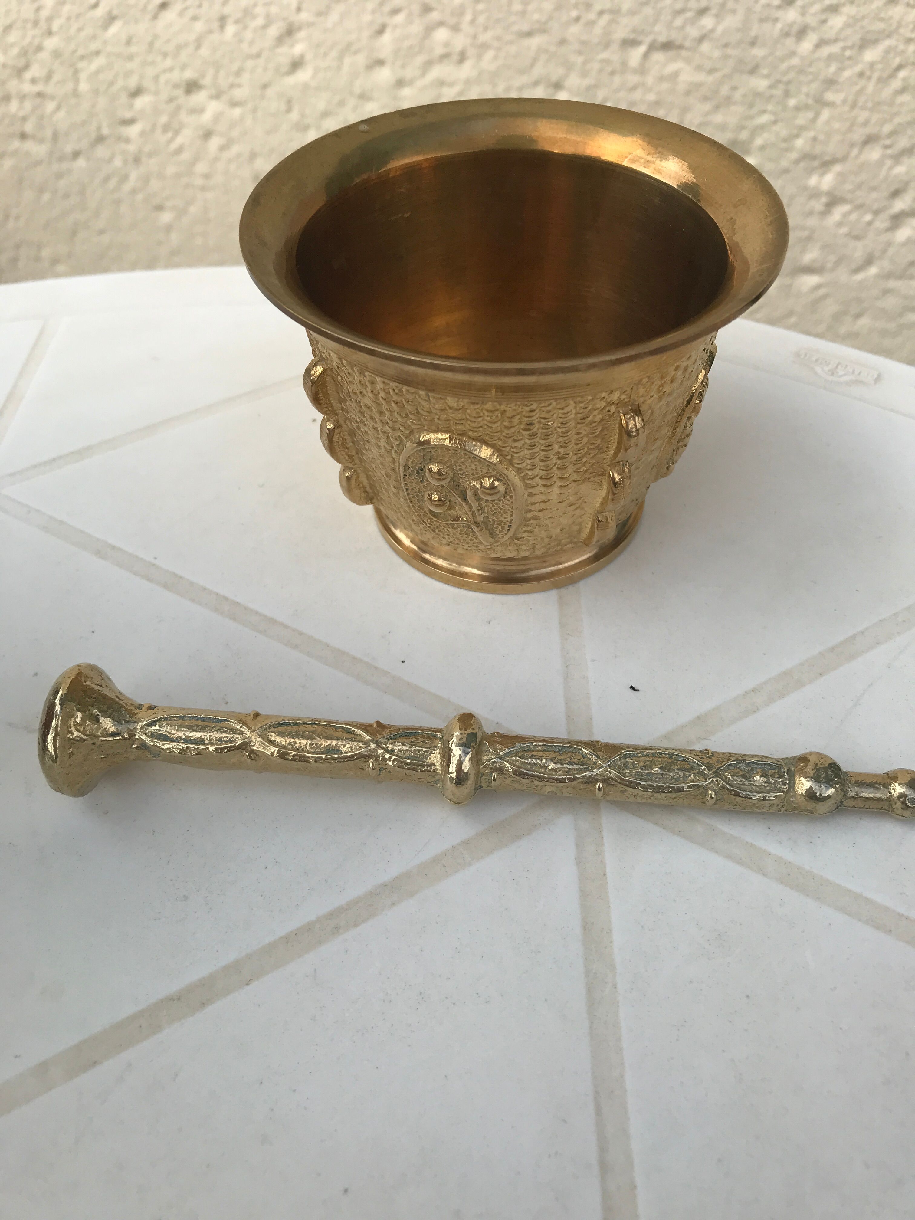 Mortar and its ancient bronze pestle