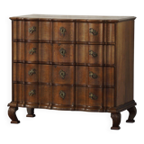 Antique baroque oak commode from the late 18th century with cabriole legs.