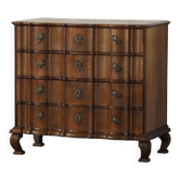 Antique baroque oak commode from the late 18th century with cabriole legs.