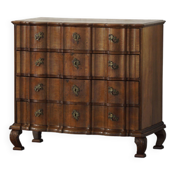 Antique baroque oak commode from the late 18th century with cabriole legs.
