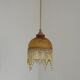 Vintage French amber mottled glass hanging ceiling light with beaded fringe.