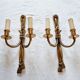 Pair of French wall sconces in bronze, Louis XVI style, with cord.