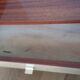 Spindle-legged bedside table