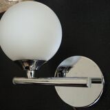 Pair of sconces with an opaline globe and chrome structure from the 1970s