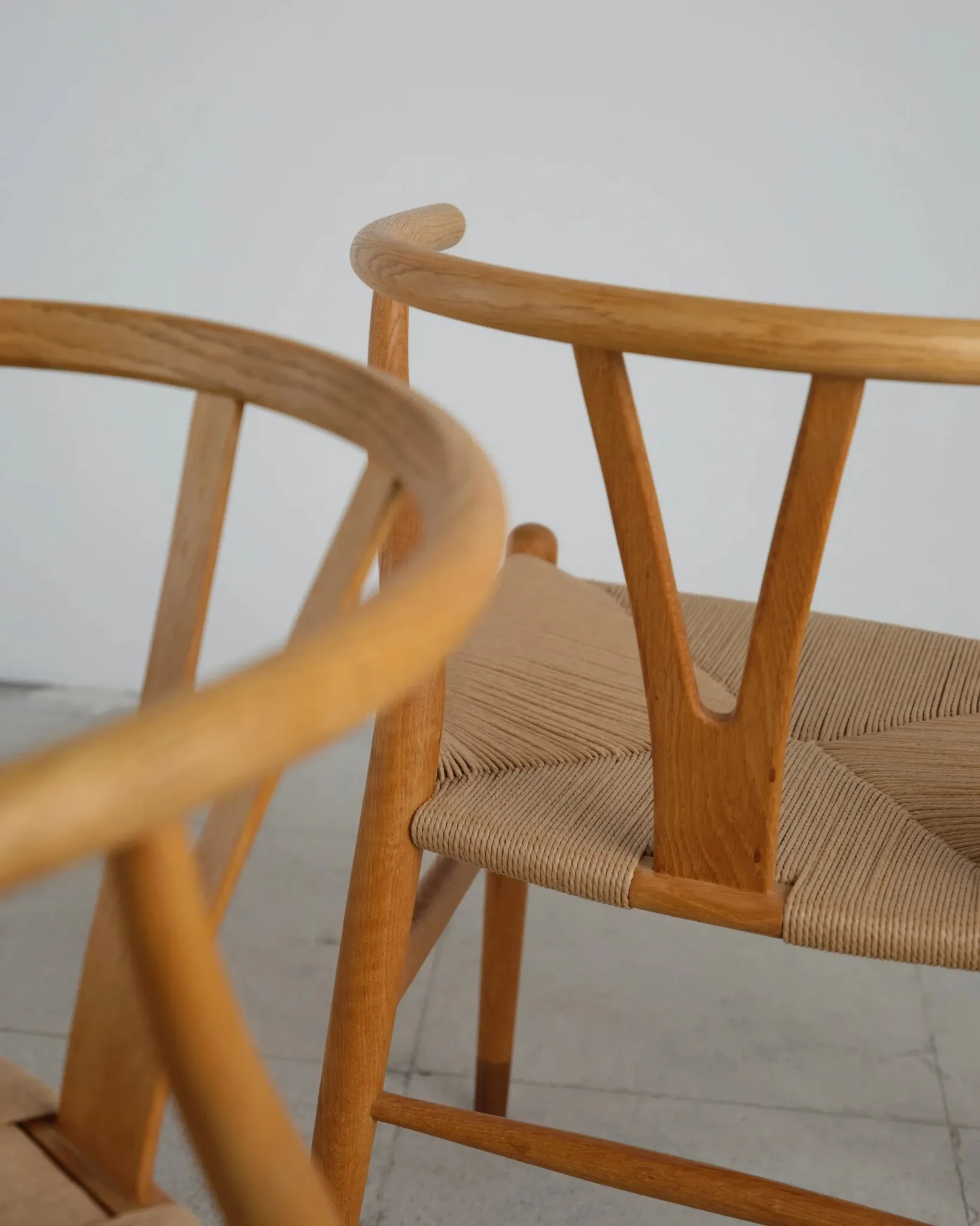 Pair of CH24 Wishbone chairs by Hans J. Wegner, Denmark, 1970s