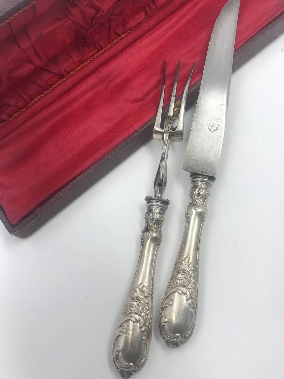 Antique silver-plated metal serving cutlery.