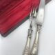 Antique silver-plated metal serving cutlery.