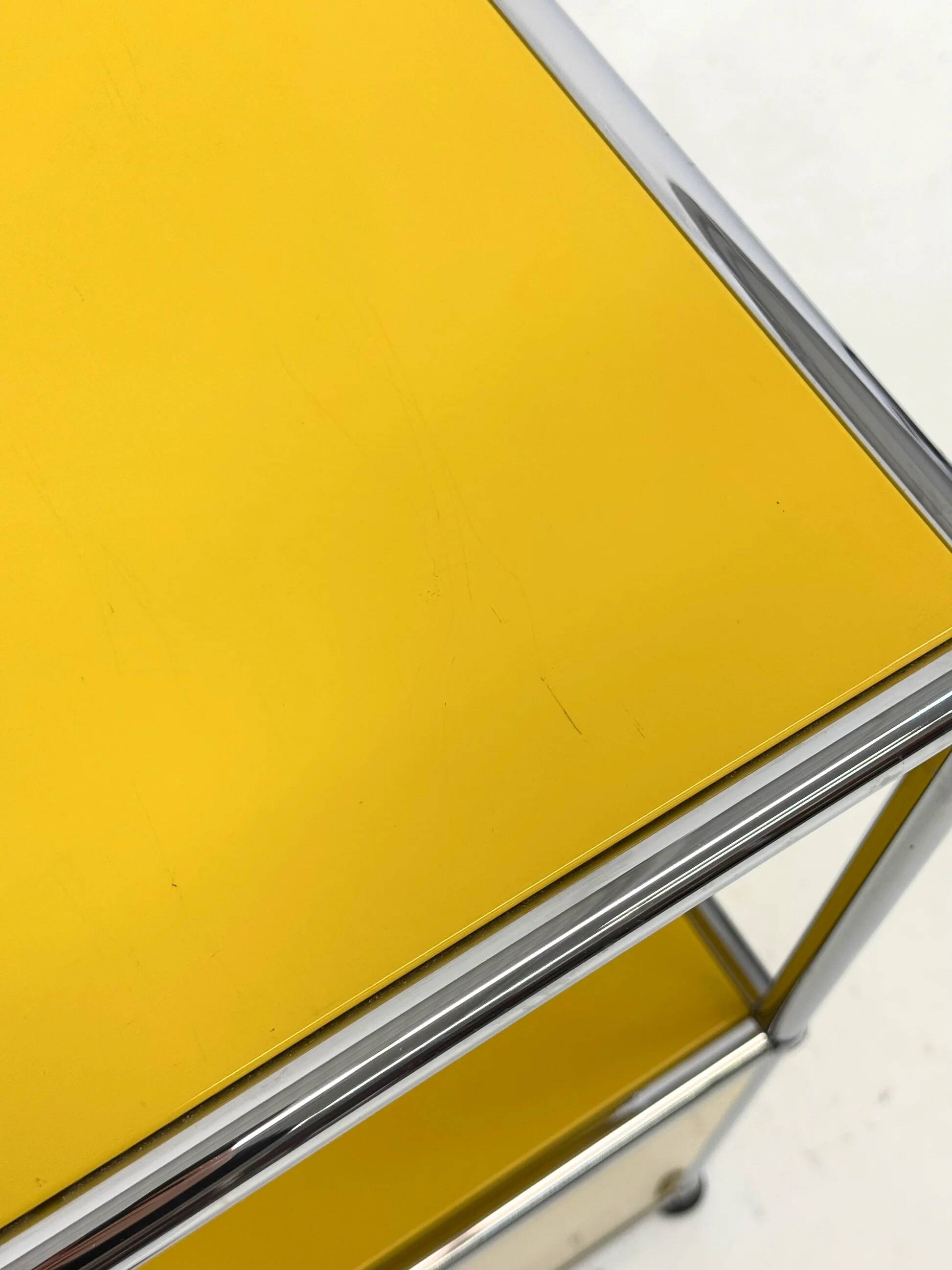 USM Haller cabinet in yellow