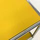 USM Haller cabinet in yellow