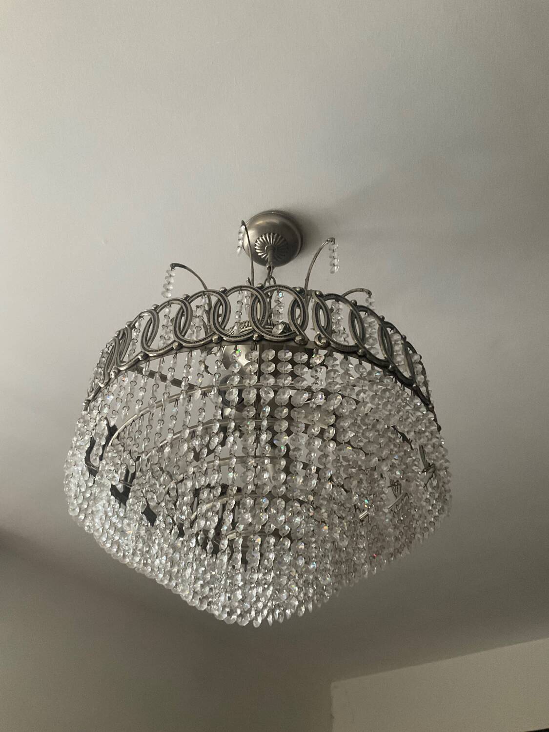 Cascading chandelier with crystal and silvered bronze pendants
