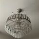 Cascading chandelier with crystal and silvered bronze pendants