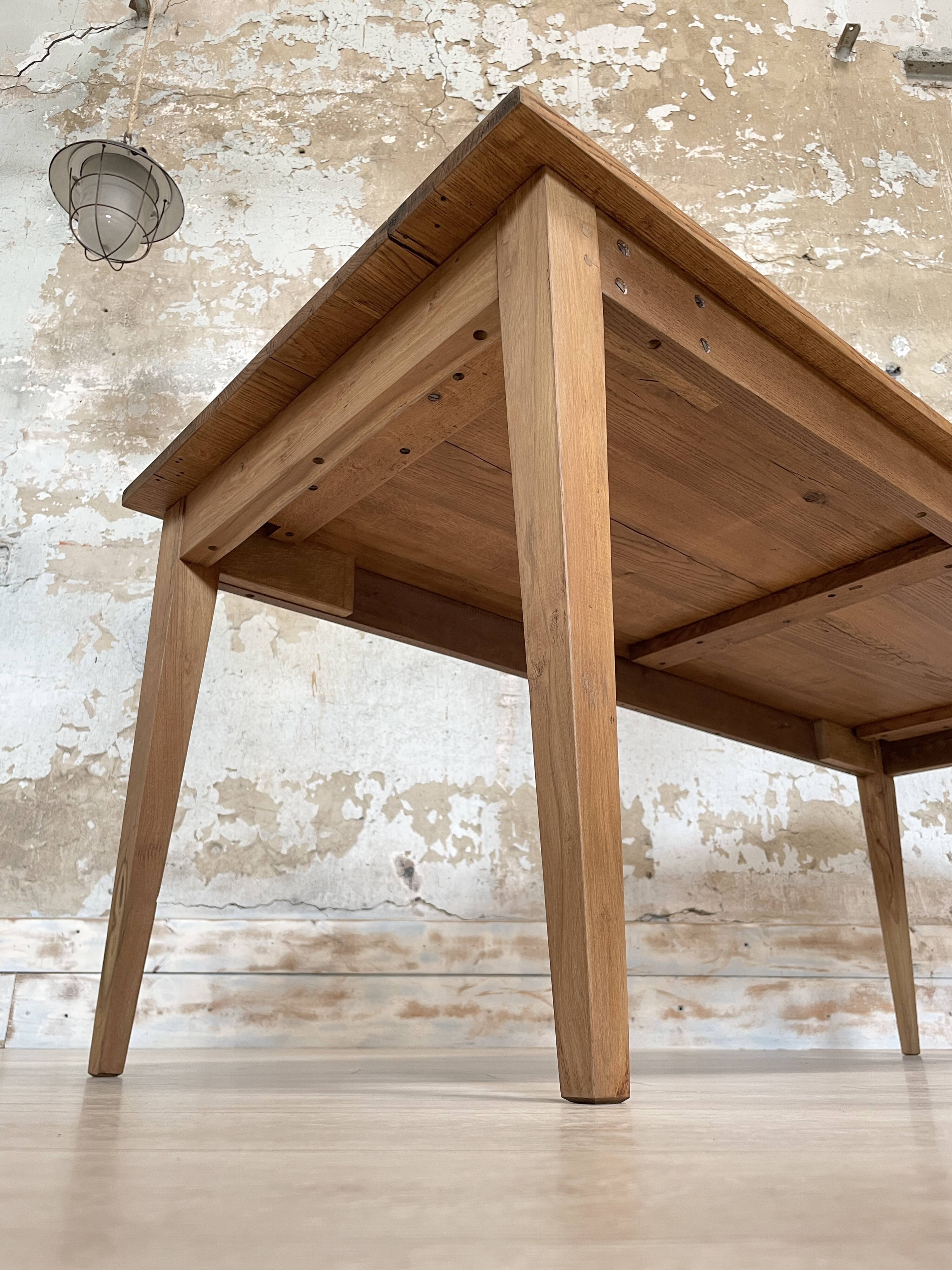 Vintage farm table with spindle legs.