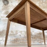 Vintage farm table with spindle legs.