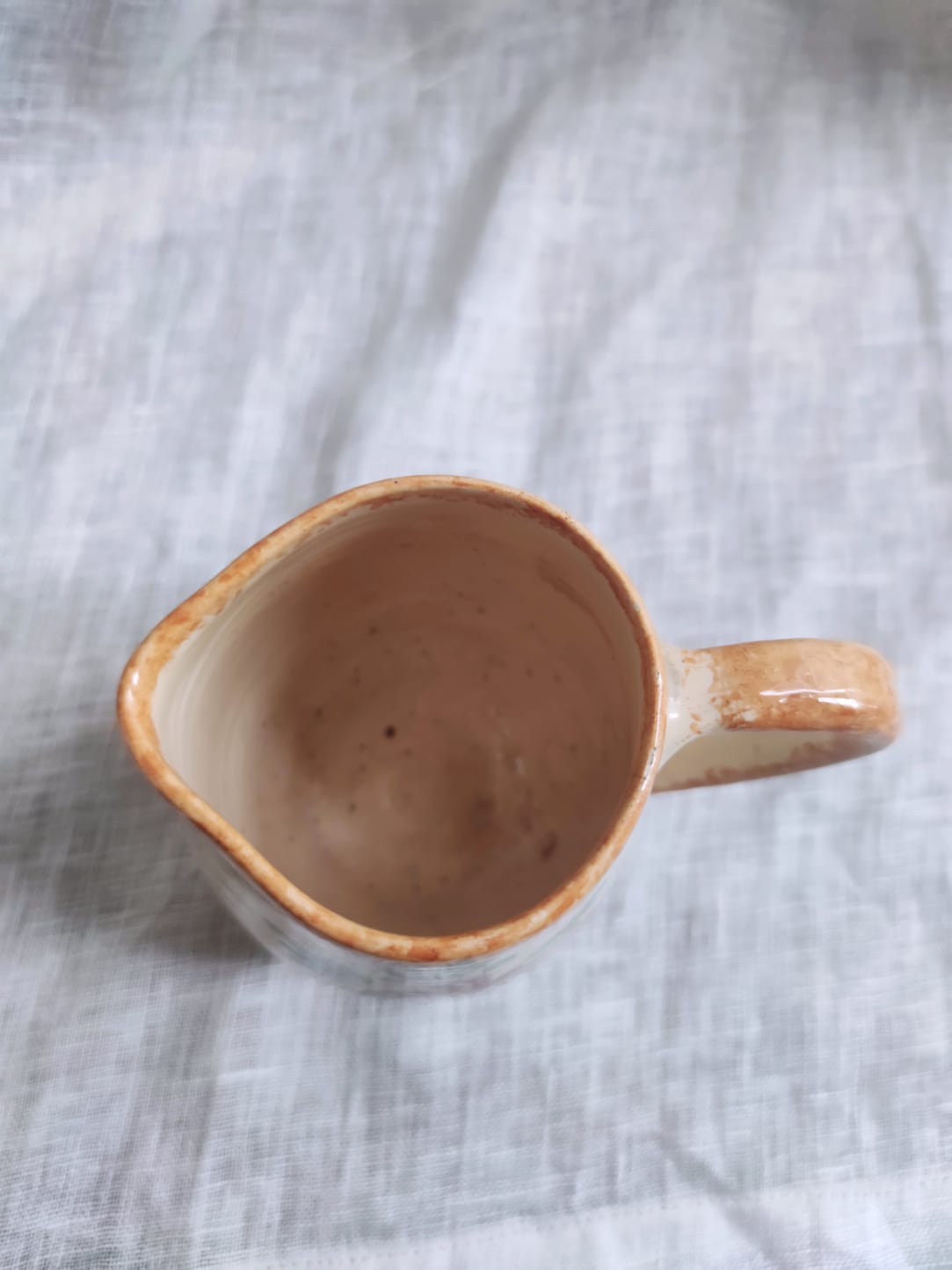 Small hand-painted pitcher