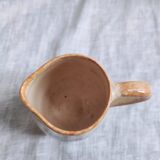 Small hand-painted pitcher