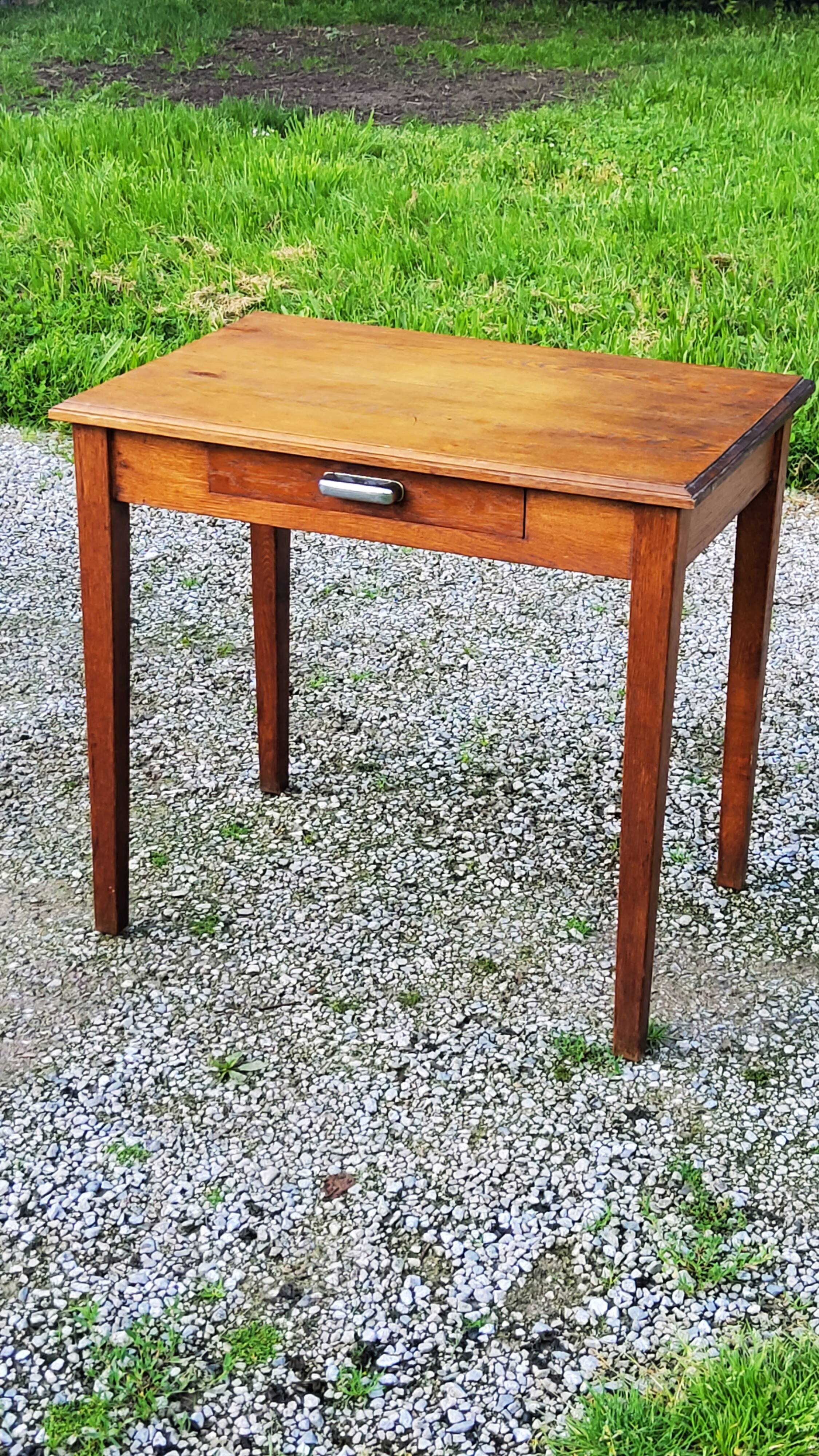 Oak writing table with spindle legs, early 20th century