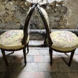 pretty pair of Louis XVI style chairs, in carved and gilded wood