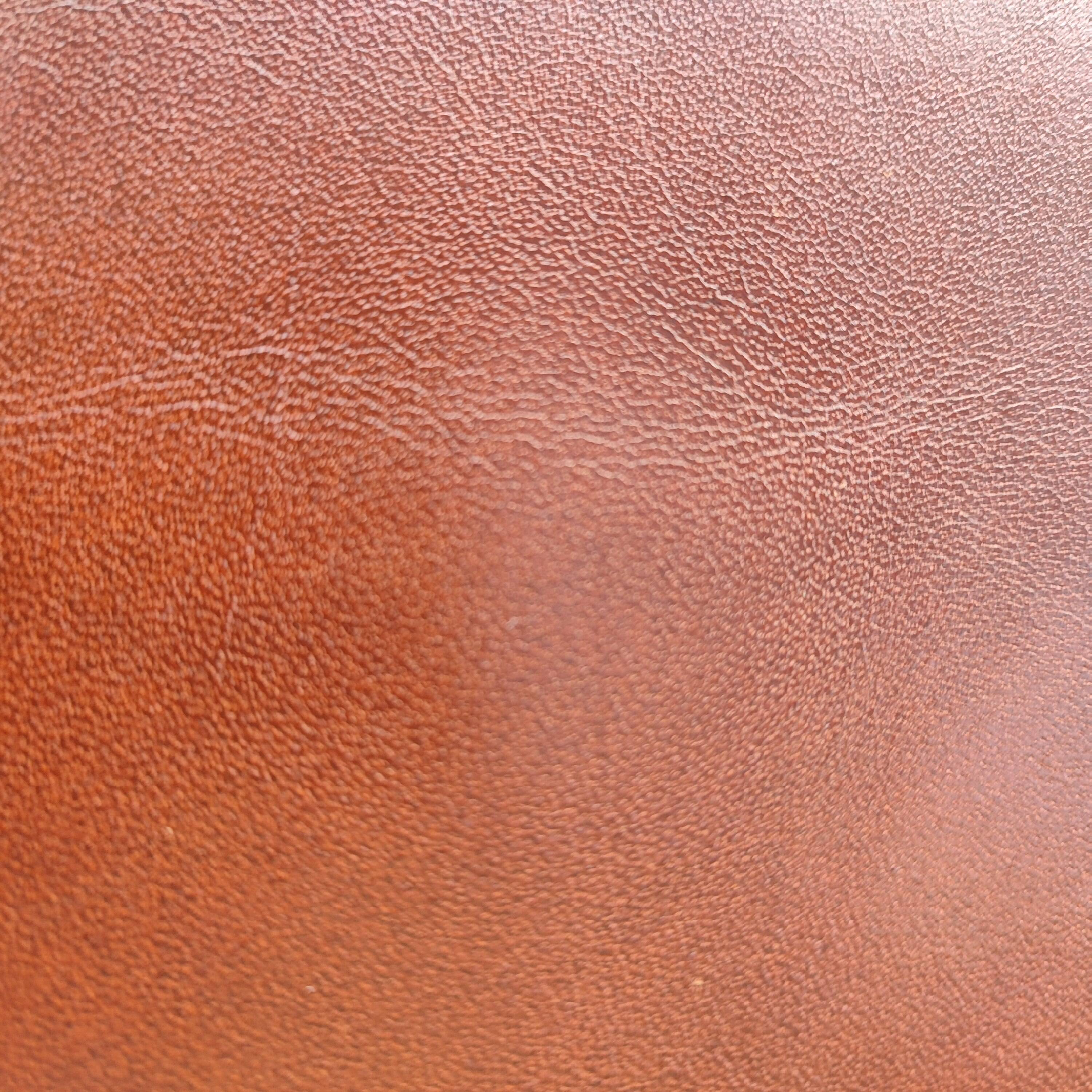 Genuine leather club chairs by Nicoletti, like new.