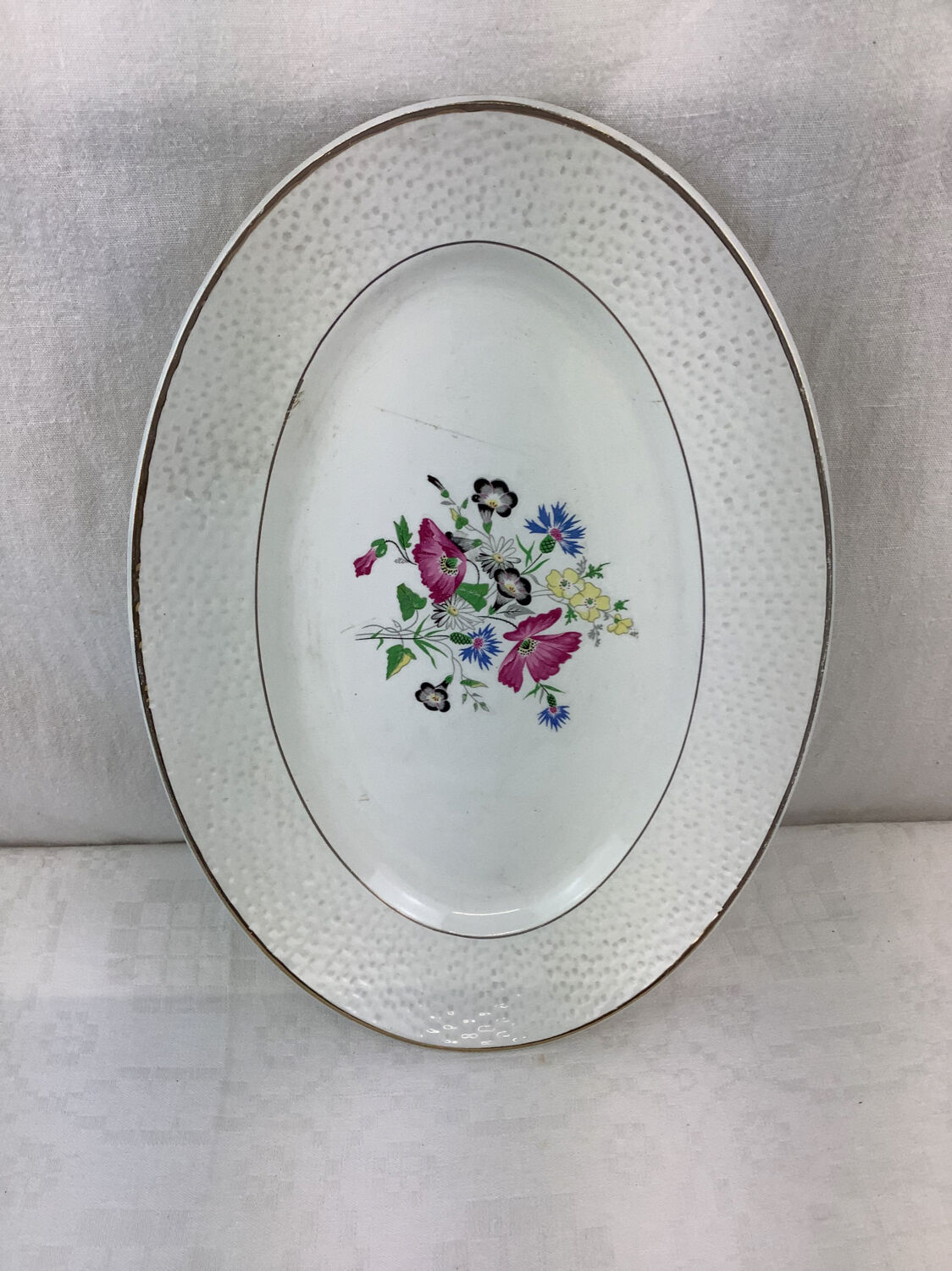 Old artisanal dish made in France Digoin