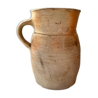 Ancient pitcher in terracotta